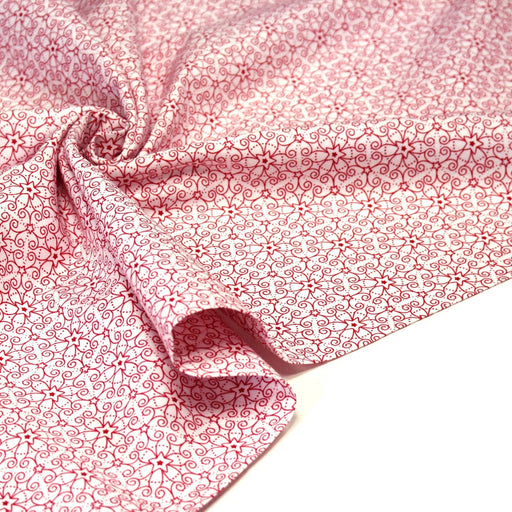 Tissu de Noël cotonnade blanc aux motifs géométriques rouges de Noël - tissuspipi.com