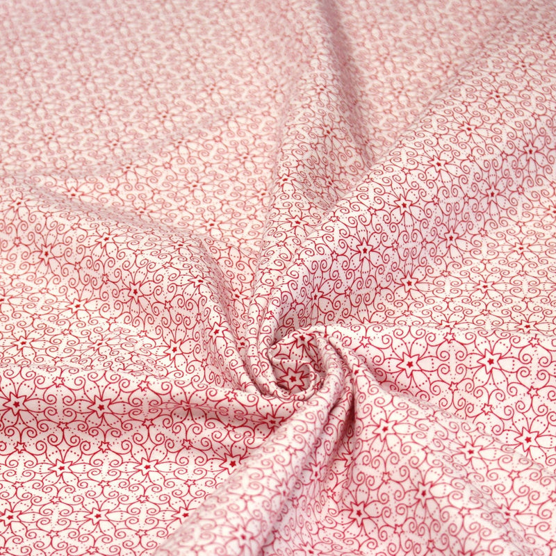 Tissu de Noël cotonnade blanc aux motifs géométriques rouges de Noël - tissuspipi.com