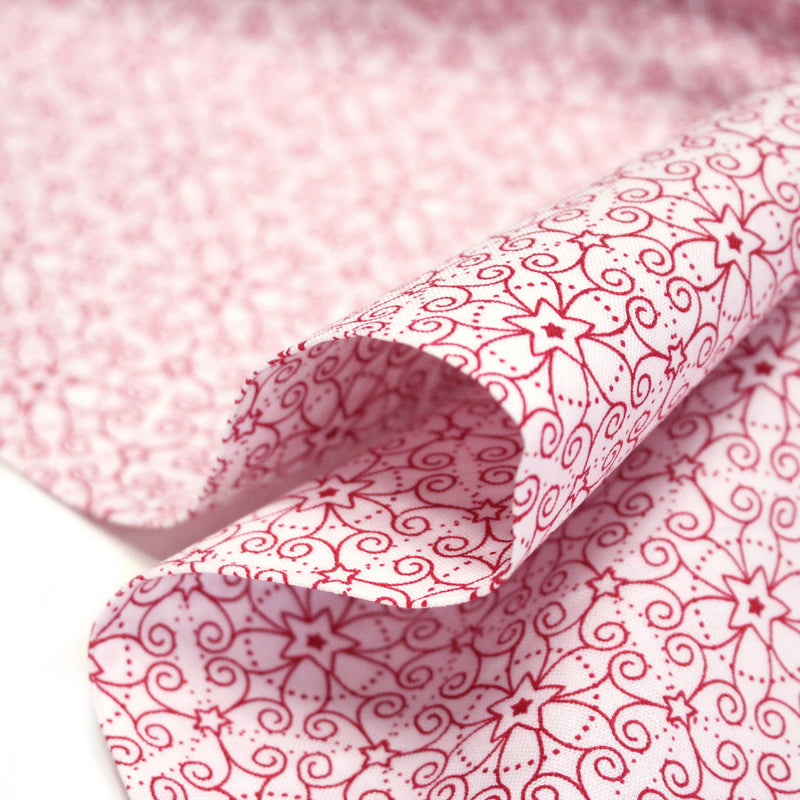 Tissu de Noël cotonnade blanc aux motifs géométriques rouges de Noël - tissuspipi.com