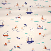 Tissu cotonnade blanc aux petits bateaux bleus et oranges - STANDARD 100 OEKO - TEX - tissuspipi.com