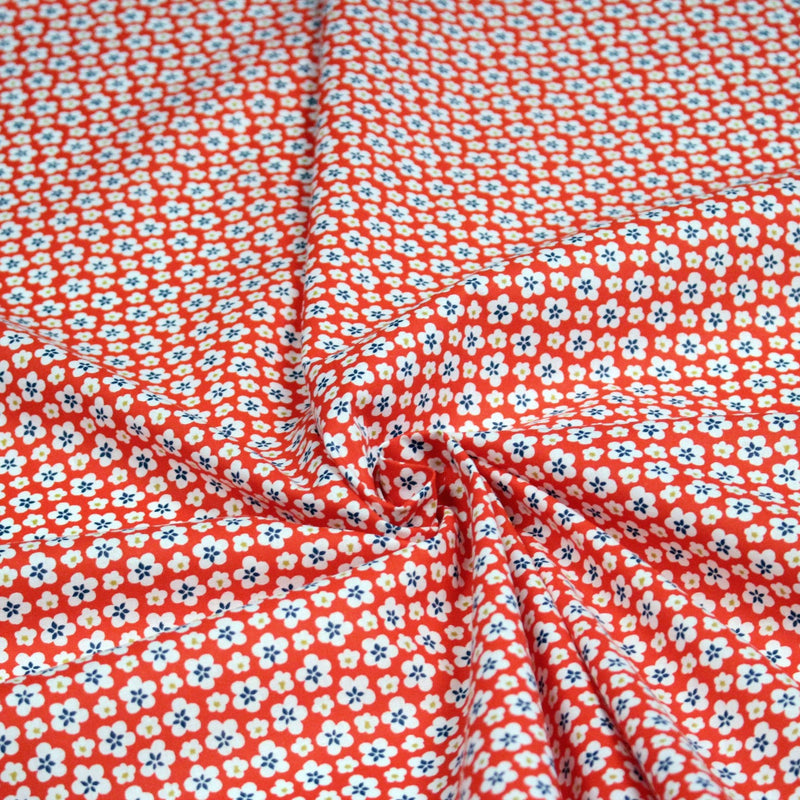 Tissu cotonnade fleurs japonaises géométriques : bleu, jaune, vert, rouge - OEKO - TEX - tissuspipi.com
