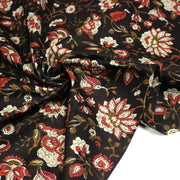 Tissu coton fin imprimé INDIENNES noir aux fleurs indiennes ocres, rouges et écrues - tissuspipi.com