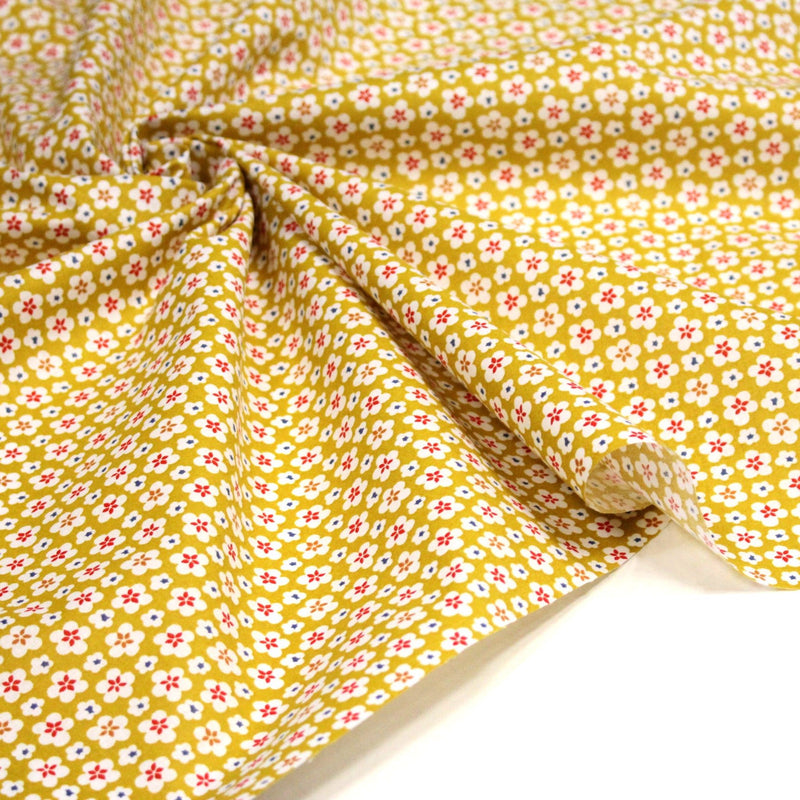 Tissu cotonnade fleurs japonaises géométriques : bleu, jaune, vert, rouge - OEKO - TEX - tissuspipi.com