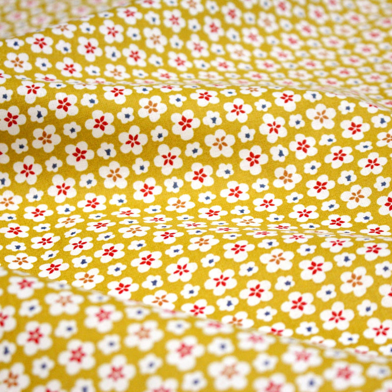 Tissu cotonnade fleurs japonaises géométriques : bleu, jaune, vert, rouge - OEKO - TEX - tissuspipi.com