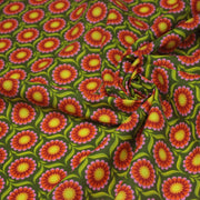 Tissu cotonnade aux fleurs SEVENTIES roses jaunes et rouges, fond kaki - OEKO-TEX STANDARD 100 - tissuspipi.com