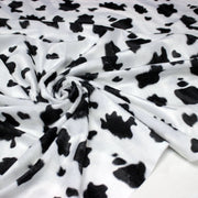 Tissu Velours imprimé motif VACHE noir et blanc - tissuspipi.com