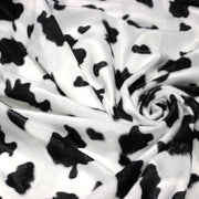 Tissu Velours imprimé motif VACHE noir et blanc - tissuspipi.com