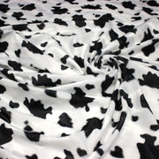 Tissu Velours imprimé motif VACHE noir et blanc - tissuspipi.com