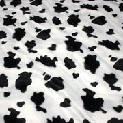 Tissu Velours imprimé motif VACHE noir et blanc - tissuspipi.com