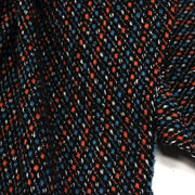 Tissu lainage faux-uni aux touches noires, corail, bleues, blanches - Fabrication italienne - tissuspipi.com