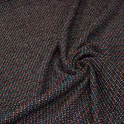 Tissu lainage faux-uni aux touches noires, corail, bleues, blanches - Fabrication italienne - tissuspipi.com