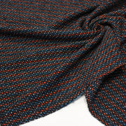Tissu lainage faux-uni aux touches noires, corail, bleues, blanches - Fabrication italienne - tissuspipi.com