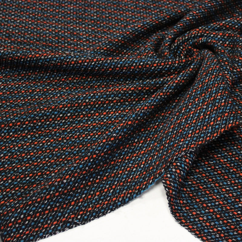 Tissu lainage faux-uni aux touches noires, corail, bleues, blanches - Fabrication italienne - tissuspipi.com