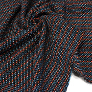 Tissu lainage faux-uni aux touches noires, corail, bleues, blanches - Fabrication italienne - tissuspipi.com