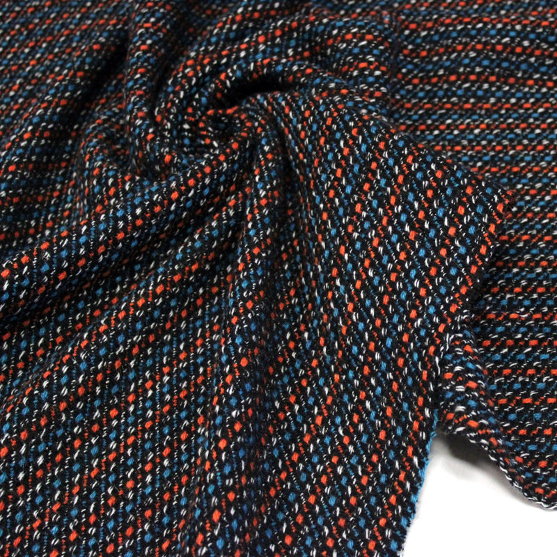 Tissu lainage faux-uni aux touches noires, corail, bleues, blanches - Fabrication italienne - tissuspipi.com