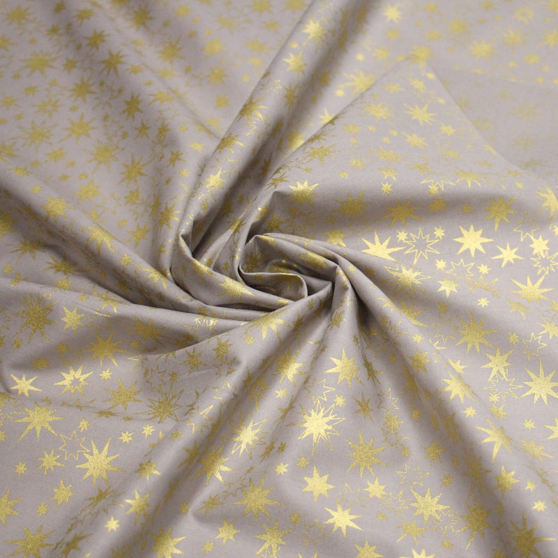 Tissu coton Noël, gris aux étoiles dorées - tissuspipi.com