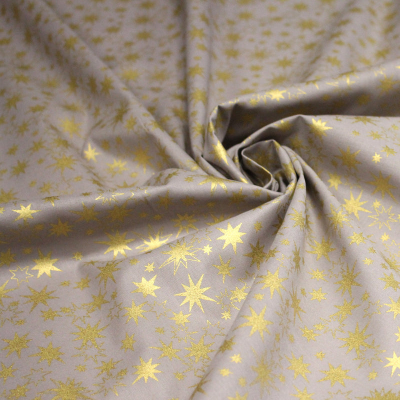 Tissu coton Noël, gris aux étoiles dorées - tissuspipi.com