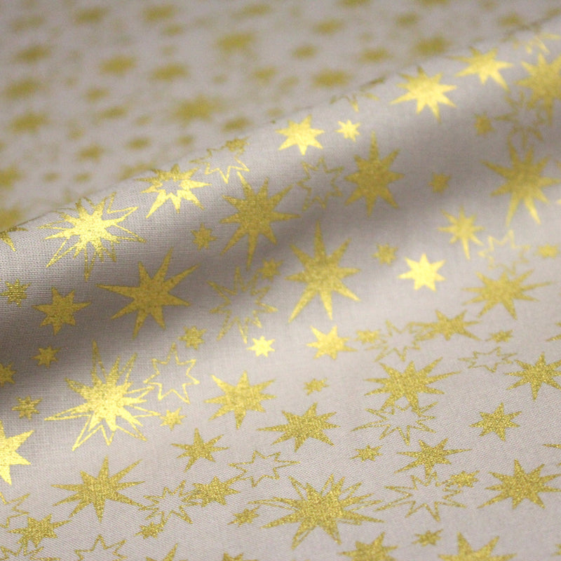 Tissu coton Noël, gris aux étoiles dorées - tissuspipi.com