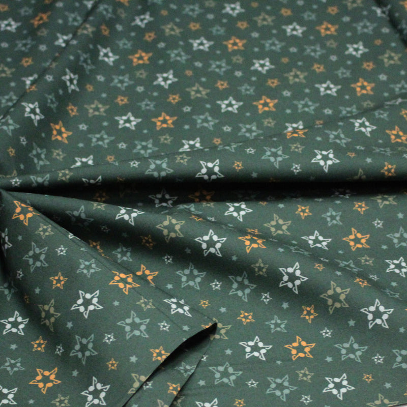 Tissu cotonnade vert aux notes de musique en étoiles - STANDARD 100 OEKO - TEX - tissuspipi.com
