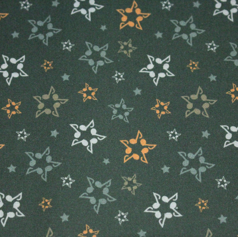 Tissu cotonnade vert aux notes de musique en étoiles - STANDARD 100 OEKO - TEX - tissuspipi.com
