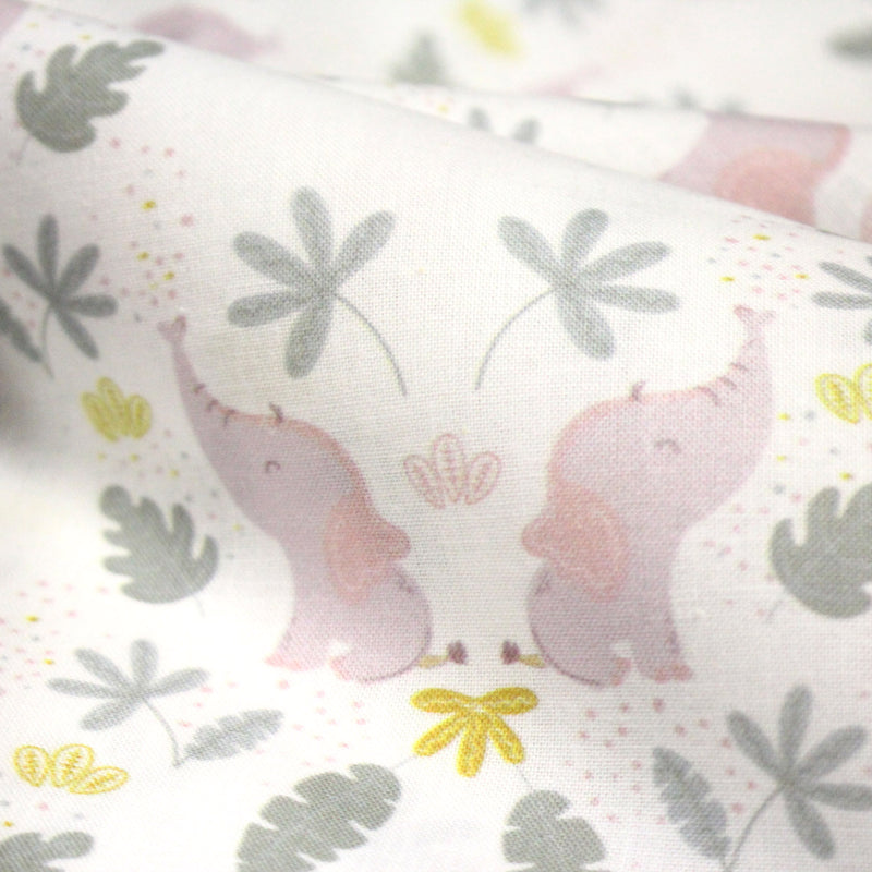 Tissu cotonnade enfant blanc aux éléphants & feuilles tropicales - STANDARD 100 OEKO - TEX - tissuspipi.com