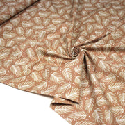 Tissu cotonnade caramel aux feuilles tropicales - STANDARD 100 OEKO - TEX - tissuspipi.com