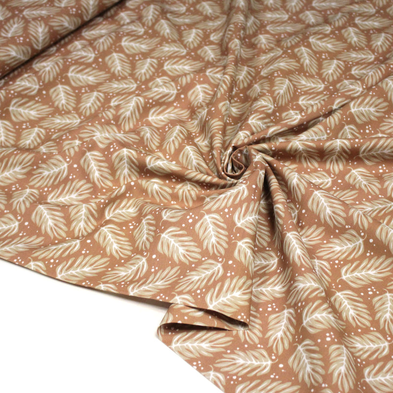 Tissu cotonnade caramel aux feuilles tropicales - STANDARD 100 OEKO - TEX - tissuspipi.com