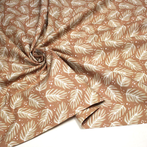 Tissu cotonnade caramel aux feuilles tropicales - STANDARD 100 OEKO - TEX - tissuspipi.com