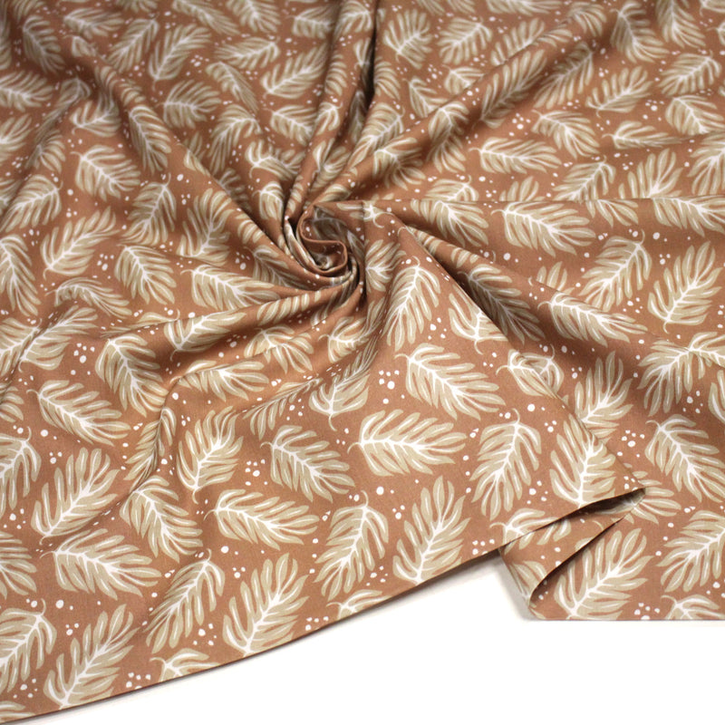 Tissu cotonnade caramel aux feuilles tropicales - STANDARD 100 OEKO - TEX - tissuspipi.com
