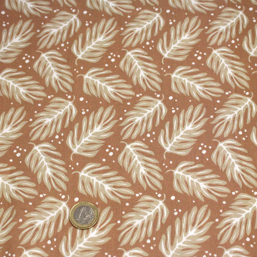 Tissu cotonnade caramel aux feuilles tropicales - STANDARD 100 OEKO - TEX - tissuspipi.com