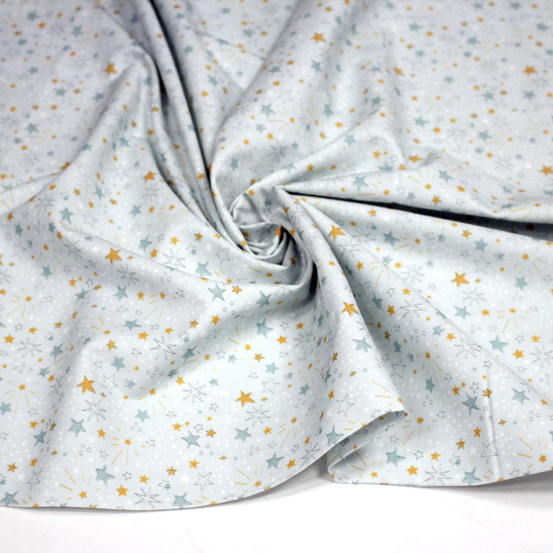 Tissu cotonnade bleu ciel aux étoiles bleues et jaunes - STANDARD 100 OEKO - TEX - tissuspipi.com