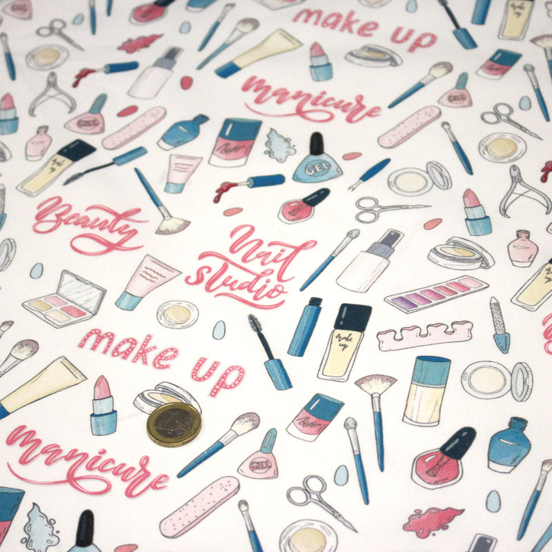Tissu cotonnade MAKE - UP GIRLY, motifs maquillages et parfums, tons roses, bleus, écrus - tissuspipi.com