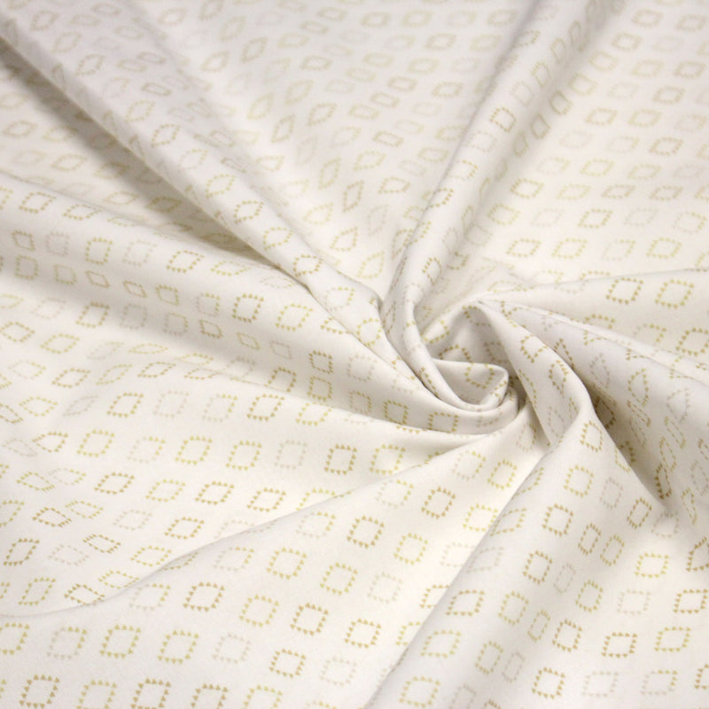 Tissu cotonnade enfant, les losanges en triangle ocres et écrus - OEKO - TEX STANDARD 100 - tissuspipi.com