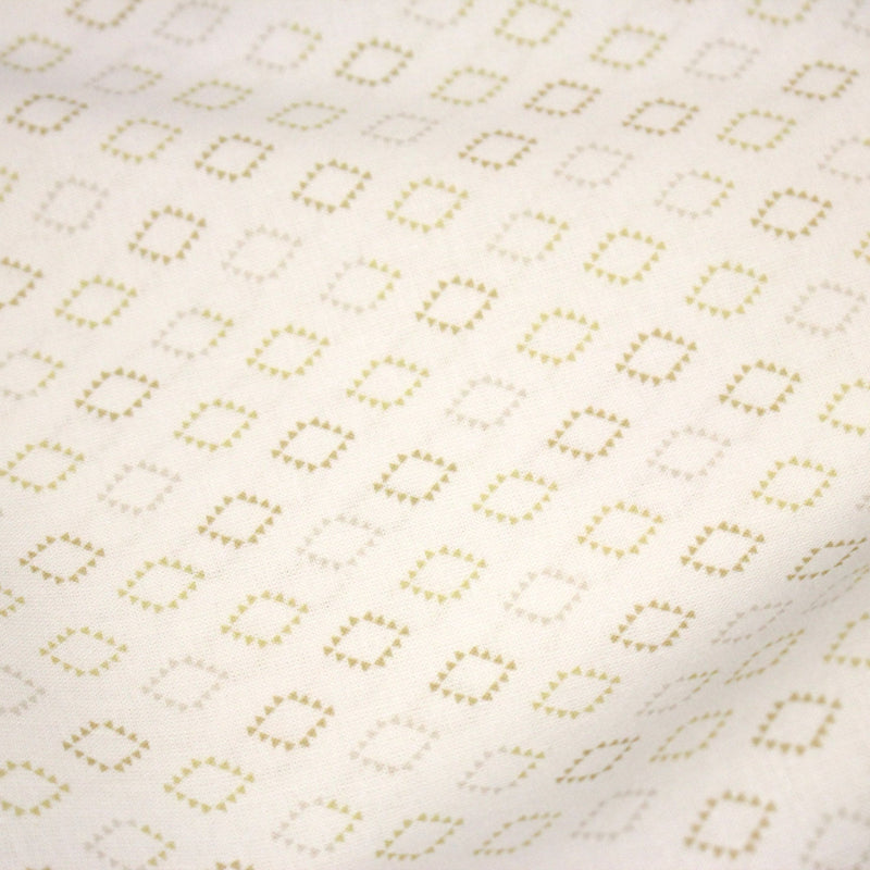Tissu cotonnade enfant, les losanges en triangle ocres et écrus - OEKO - TEX STANDARD 100 - tissuspipi.com