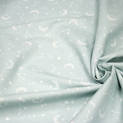 Tissu cotonnade enfant, constellation blanche, lune et étoiles fond vert clair - OEKO - TEX STANDARD 100 - tissuspipi.com