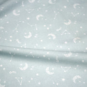 Tissu cotonnade enfant, constellation blanche, lune et étoiles fond vert clair - OEKO - TEX STANDARD 100 - tissuspipi.com