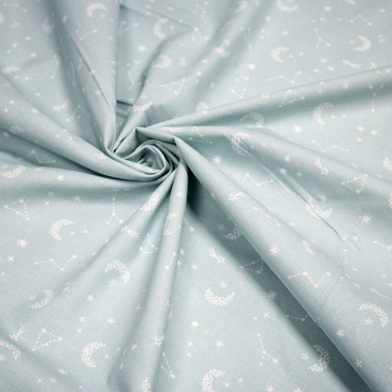 Tissu cotonnade enfant, constellation blanche, lune et étoiles fond vert clair - OEKO - TEX STANDARD 100 - tissuspipi.com