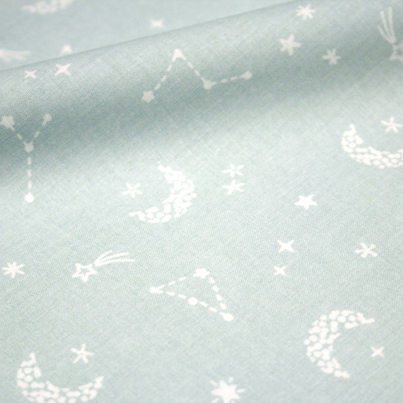Tissu cotonnade enfant, constellation blanche, lune et étoiles fond vert clair - OEKO - TEX STANDARD 100 - tissuspipi.com