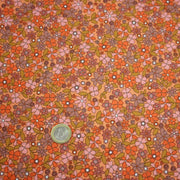 Tissu cotonnade fleuri corail aux fines fleurs roses, ocres et parme - OEKO - TEX STANDARD 100 - tissuspipi.com