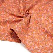 Tissu cotonnade fleuri corail aux fines fleurs roses, ocres et parme - OEKO - TEX STANDARD 100 - tissuspipi.com