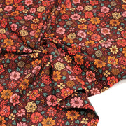 Tissu velours milleraies imprimé SEVENTIES choco aux fleurs rouge roses oranges - STANDARD 100 OEKO-TEX - tissuspipi.com