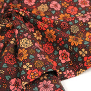 Tissu velours milleraies imprimé SEVENTIES choco aux fleurs rouge roses oranges - STANDARD 100 OEKO-TEX - tissuspipi.com