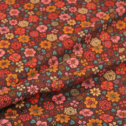 Tissu velours milleraies imprimé SEVENTIES choco aux fleurs rouge roses oranges - STANDARD 100 OEKO-TEX - tissuspipi.com