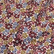 Tissu velours milleraies imprimé écru aux fleurs bordeaux, ocre, fleur pétrole - STANDARD 100 OEKO-TEX - tissuspipi.com