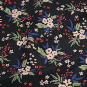 Tissu velours milleraies imprimé noir aux fleurs écrues, bleues, vertes - STANDARD 100 OEKO-TEX - tissuspipi.com