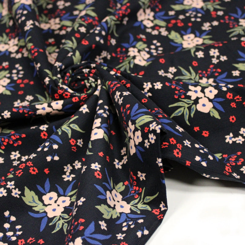 Tissu velours milleraies imprimé noir aux fleurs écrues, bleues, vertes - STANDARD 100 OEKO-TEX - tissuspipi.com