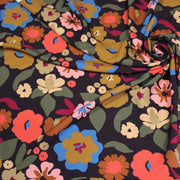 Tissu Viscose fluide fleurs graphiques rétro multicolores, fond noir – STANDARD 100 OEKO-TEX - tissuspipi.com