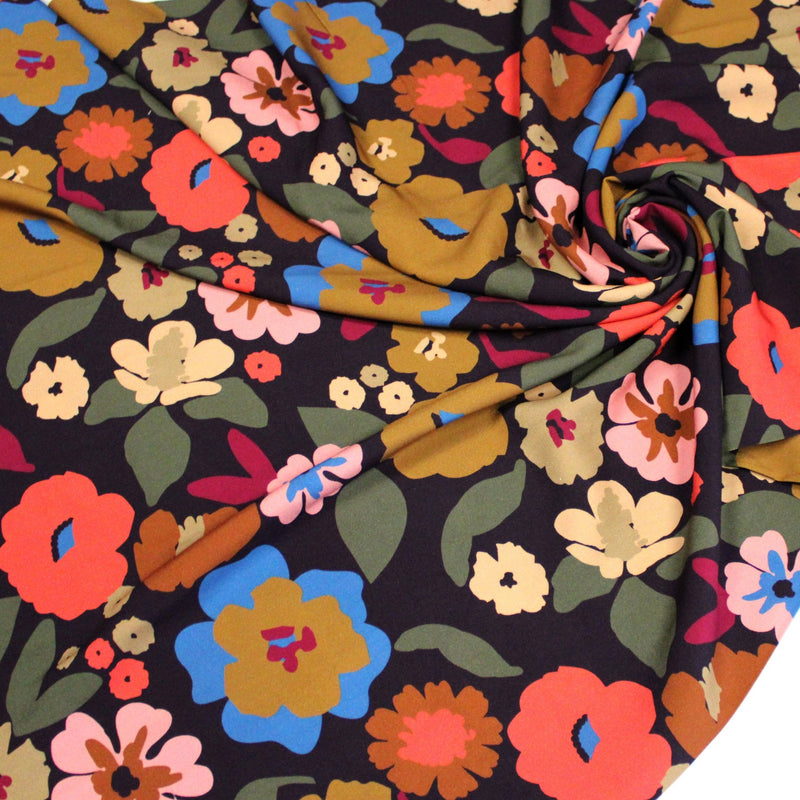 Tissu Viscose fluide fleurs graphiques rétro multicolores, fond noir – STANDARD 100 OEKO-TEX - tissuspipi.com