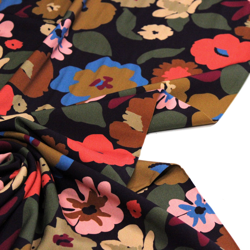 Tissu Viscose fluide fleurs graphiques rétro multicolores, fond noir – STANDARD 100 OEKO-TEX - tissuspipi.com