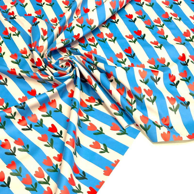 Tissu habillement imperméable, Rayures bleues & tulipes roses rouges - STANDARD 100 by OEKO-TEX - tissuspipi.com